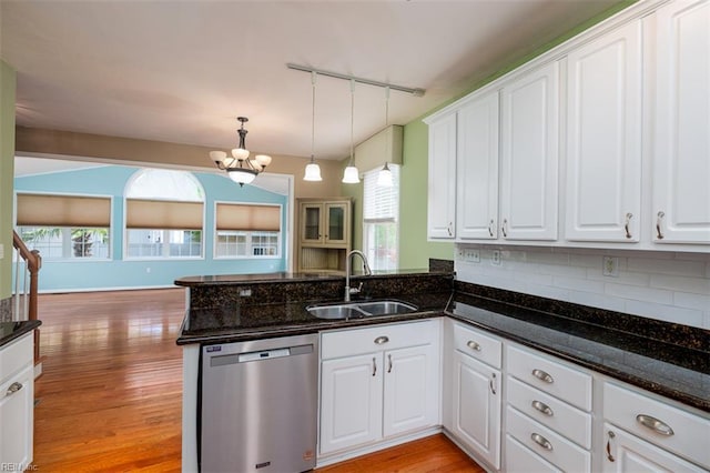 9574 14th Bay St, Norfolk, VA 23518 - kitchen featuring dishwasher, a sink, track lighting, a chandelier, and a peninsula