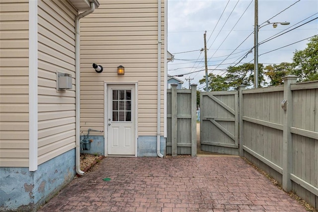 9574 14th Bay St, Norfolk, VA 23518 - view of patio / terrace with a gate and fence