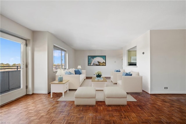 7320 Glenroie Ave Unit 8E, Norfolk, VA 23505 - living room with baseboards