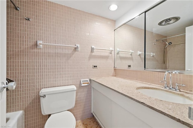 7320 Glenroie Ave Unit 8E, Norfolk, VA 23505 - full bath featuring tile walls, toilet, vanity, and a shower