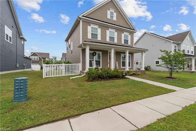 954 Olmstead St, Chesapeake, VA 23323 - view of front of property with covered porch and a front yard