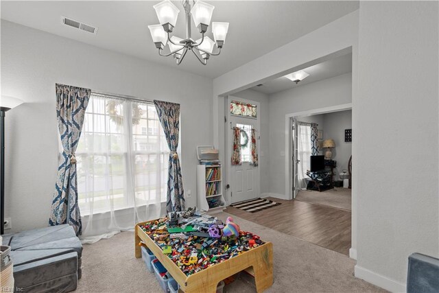 954 Olmstead St, Chesapeake, VA 23323 - rec room featuring a chandelier, carpet flooring, and baseboards
