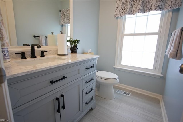 2933 Crossings Dr, Chesapeake, VA 23321 - bathroom featuring baseboards, healthy amount of natural light, toilet, and vanity