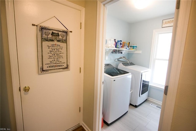 2933 Crossings Dr, Chesapeake, VA 23321 - clothes washing area featuring washing machine and clothes dryer and baseboards