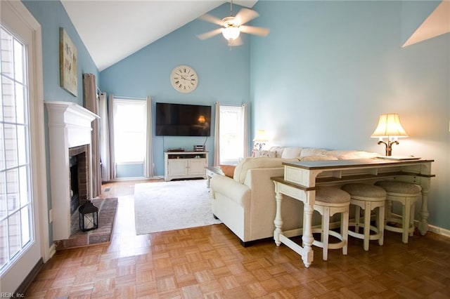 2933 Crossings Dr, Chesapeake, VA 23321 - living area featuring high vaulted ceiling, ceiling fan, baseboards, and a fireplace