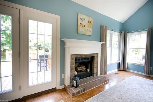 2933 Crossings Dr, Chesapeake, VA 23321 - living room with vaulted ceiling, a fireplace, and baseboards
