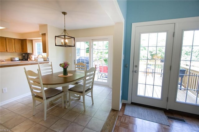 2933 Crossings Dr, Chesapeake, VA 23321 - dining area featuring baseboards