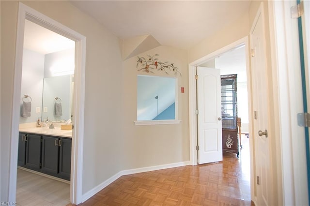 2933 Crossings Dr, Chesapeake, VA 23321 - corridor featuring baseboards and a sink