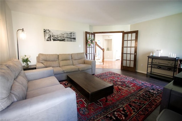 2933 Crossings Dr, Chesapeake, VA 23321 - living area with wood finished floors, french doors, and baseboards