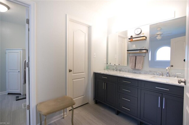 2933 Crossings Dr, Chesapeake, VA 23321 - bathroom featuring double vanity and ceiling fan
