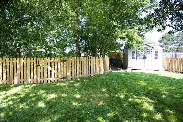 2933 Crossings Dr, Chesapeake, VA 23321 - view of yard featuring an outbuilding and a storage unit