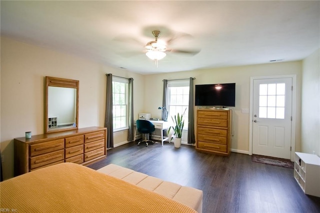 2933 Crossings Dr, Chesapeake, VA 23321 - bedroom featuring multiple windows, dark wood-type flooring, an office area, and a ceiling fan