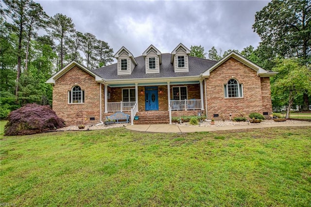 1813 Taft Rd, Chesapeake, VA 23322 - new england style home featuring crawl space, brick siding, covered porch, a front lawn, and a shingled roof