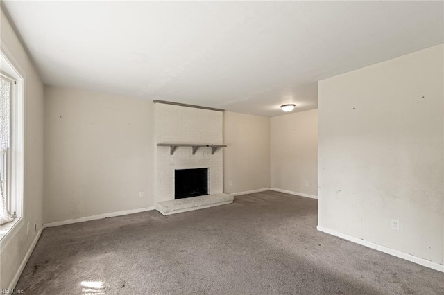 102 Basswood Dr, Newport News, VA 23601 - unfurnished living room with carpet, a fireplace, and baseboards
