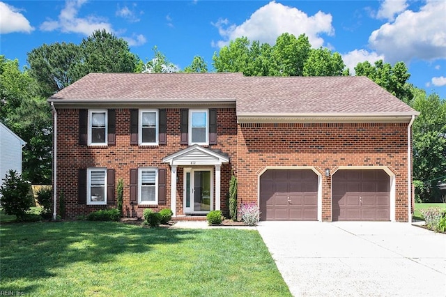 view of front of property featuring concrete driveway, brick siding, a front yard, and roof with shingles