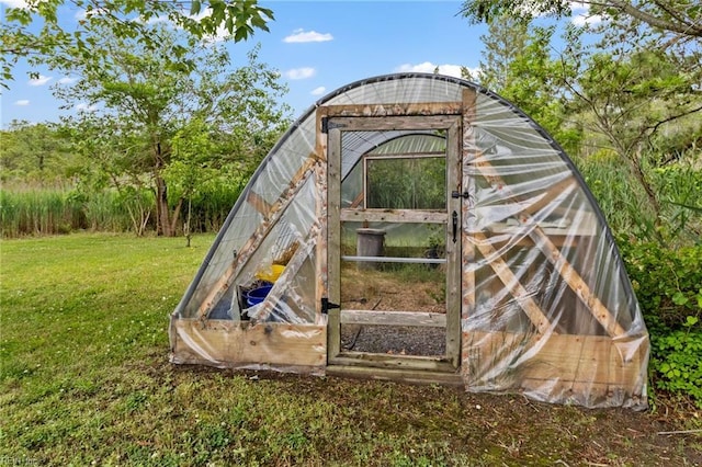150 Ridge Rd, Poquoson, VA 23662 - view of greenhouse featuring a lawn