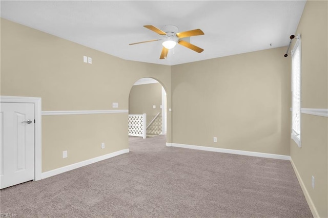 242 Genoa Dr Unit 20, Hampton, VA 23664 - empty room with a ceiling fan, carpet flooring, arched walkways, and baseboards