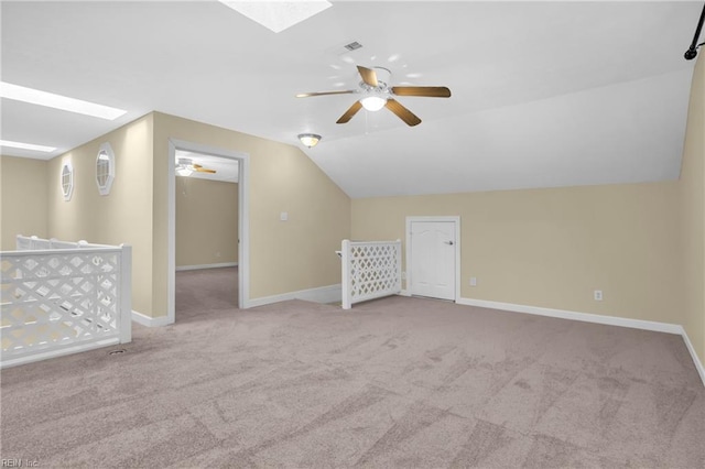 242 Genoa Dr Unit 20, Hampton, VA 23664 - bonus room with a skylight, ceiling fan, carpet flooring, baseboards, and vaulted ceiling