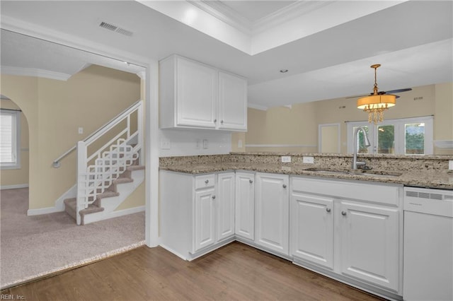 242 Genoa Dr Unit 20, Hampton, VA 23664 - kitchen with dishwasher, a sink, crown molding, wood finished floors, and arched walkways