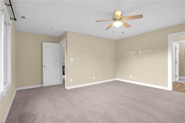 242 Genoa Dr Unit 20, Hampton, VA 23664 - empty room featuring a ceiling fan, carpet floors, and baseboards