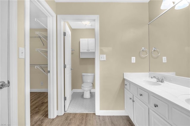 242 Genoa Dr Unit 20, Hampton, VA 23664 - full bath with double vanity, toilet, wood finished floors, and baseboards