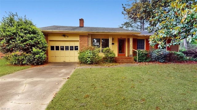 1030 Mary Peake Blvd, Hampton, VA 23666 - view of front facade with an attached garage, a front lawn, concrete driveway, and a chimney