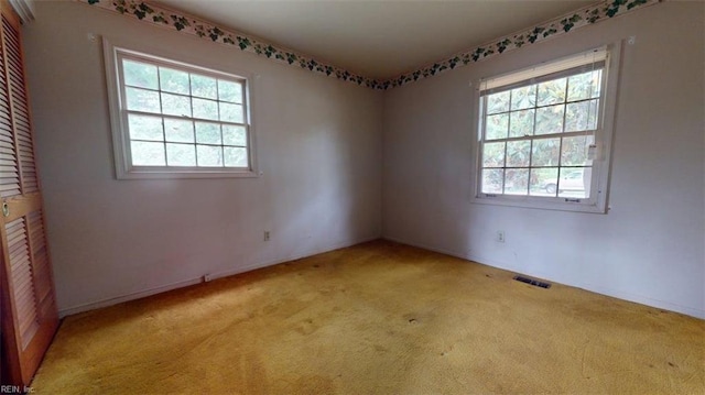 1030 Mary Peake Blvd, Hampton, VA 23666 - spare room featuring light colored carpet and baseboards