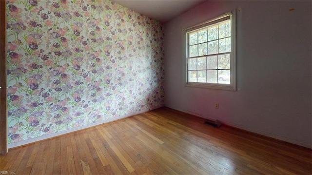1030 Mary Peake Blvd, Hampton, VA 23666 - unfurnished room with wood-type flooring and baseboards
