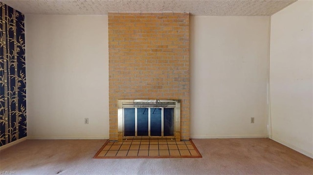 1030 Mary Peake Blvd, Hampton, VA 23666 - unfurnished living room featuring a fireplace, carpet floors, a textured ceiling, and baseboards
