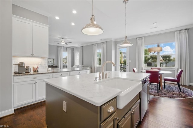 2244 Rio Rancho Dr, Virginia Beach, VA 23456 - kitchen with a sink, recessed lighting, decorative backsplash, a kitchen island with sink, and white cabinetry