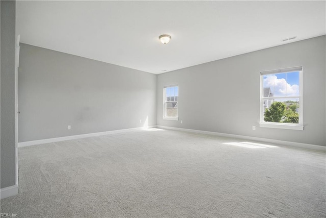 2244 Rio Rancho Dr, Virginia Beach, VA 23456 - spare room featuring carpet flooring and baseboards