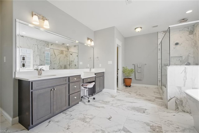 2244 Rio Rancho Dr, Virginia Beach, VA 23456 - full bathroom featuring a marble finish shower, marble finish flooring, a tub to relax in, double vanity, and baseboards
