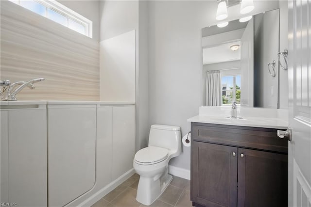 2244 Rio Rancho Dr, Virginia Beach, VA 23456 - bathroom featuring toilet, plenty of natural light, vanity, and tile patterned floors