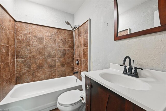 3813 Honeytree Ln, Virginia Beach, VA 23452 - bathroom featuring a textured wall, shower / bathtub combination, toilet, and vanity