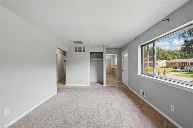 3813 Honeytree Ln, Virginia Beach, VA 23452 - unfurnished bedroom featuring light carpet, baseboards, and a closet