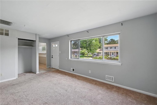 3813 Honeytree Ln, Virginia Beach, VA 23452 - unfurnished bedroom with multiple windows, carpet, and baseboards
