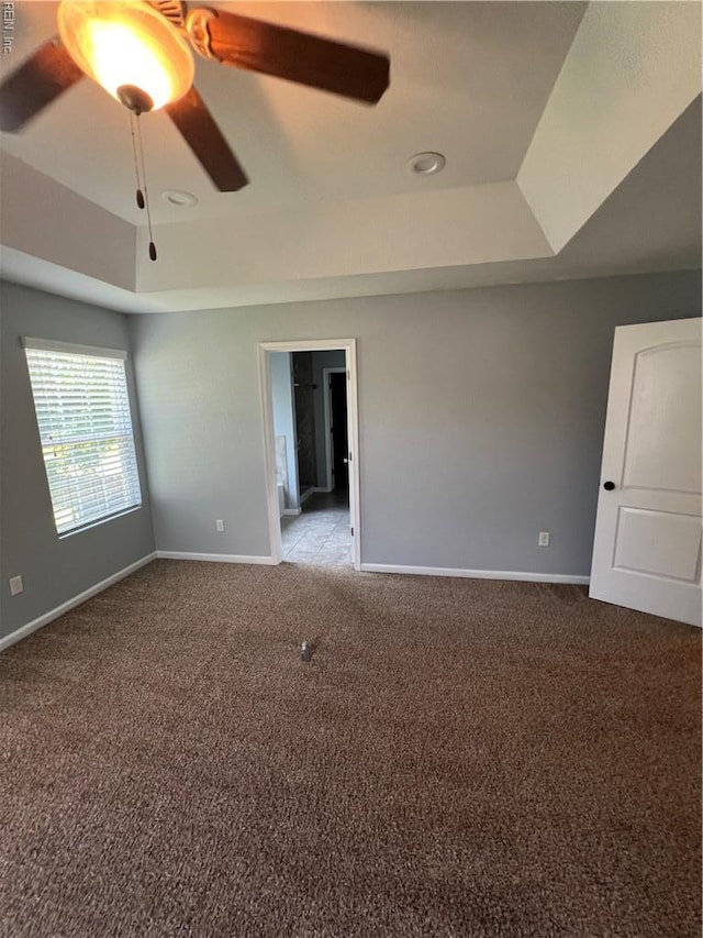 405 San Antonio Blvd, Norfolk, VA 23505 - carpeted empty room featuring a raised ceiling, baseboards, and ceiling fan