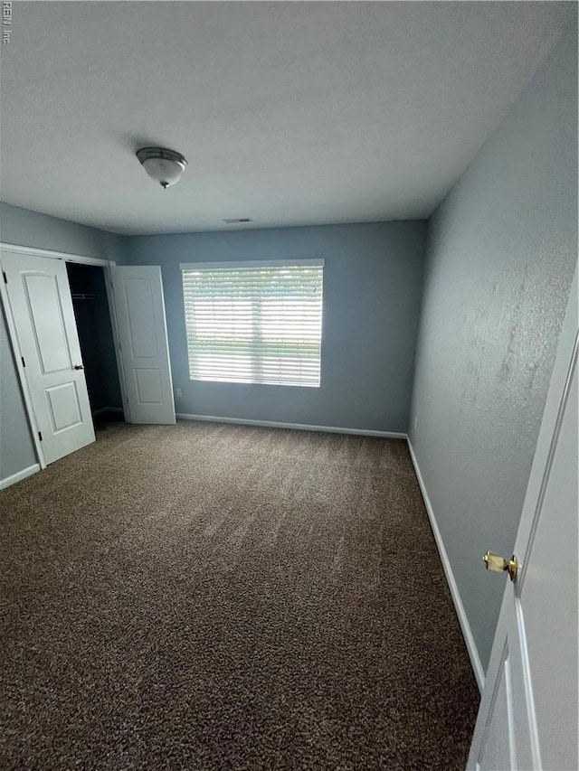 405 San Antonio Blvd, Norfolk, VA 23505 - unfurnished bedroom featuring baseboards, carpet flooring, and a closet