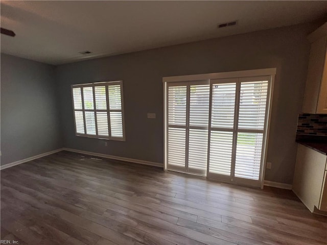 405 San Antonio Blvd, Norfolk, VA 23505 - unfurnished room with baseboards and wood finished floors