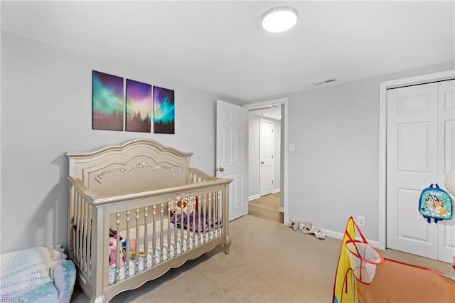 6944 Crittenden Rd, Suffolk, VA 23432 - carpeted bedroom with baseboards and a closet