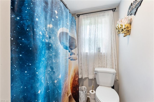 6944 Crittenden Rd, Suffolk, VA 23432 - full bathroom with a shower with shower curtain and toilet