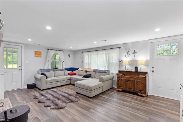 6944 Crittenden Rd, Suffolk, VA 23432 - living room with wood finished floors, recessed lighting, and baseboards