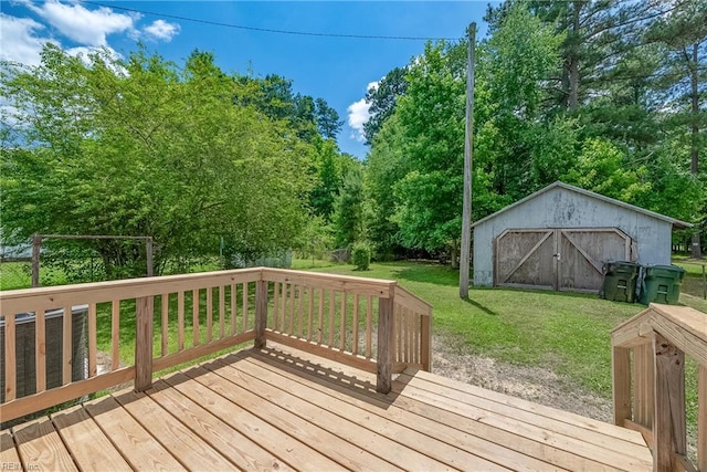 302 Artis St, Franklin, VA 23851 - wooden deck with a barn, a yard, and an outbuilding