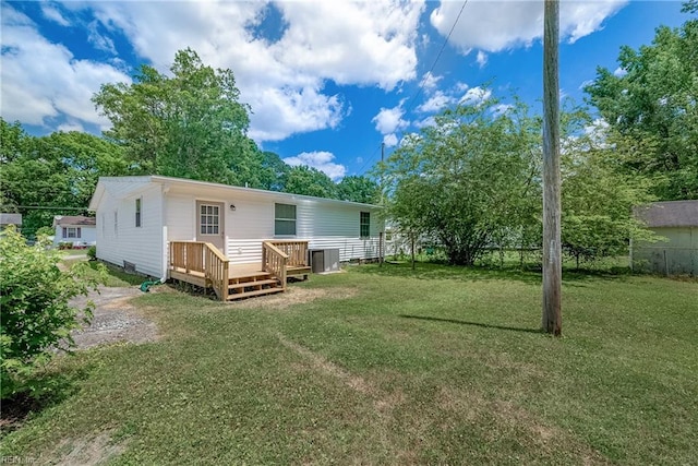 302 Artis St, Franklin, VA 23851 - rear view of house featuring a deck and central AC