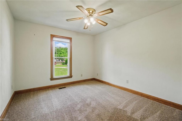 1121 Vineyard Dr, Chesapeake, VA 23322 - spare room featuring carpet floors, baseboards, and a ceiling fan