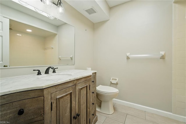 1121 Vineyard Dr, Chesapeake, VA 23322 - bathroom with toilet, vanity, tile patterned flooring, baseboards, and a shower