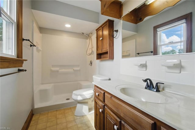 1121 Vineyard Dr, Chesapeake, VA 23322 - bathroom with toilet, a shower, vanity, baseboards, and recessed lighting