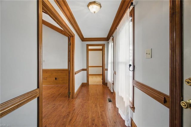 1121 Vineyard Dr, Chesapeake, VA 23322 - hall featuring crown molding, wood finished floors, and baseboards