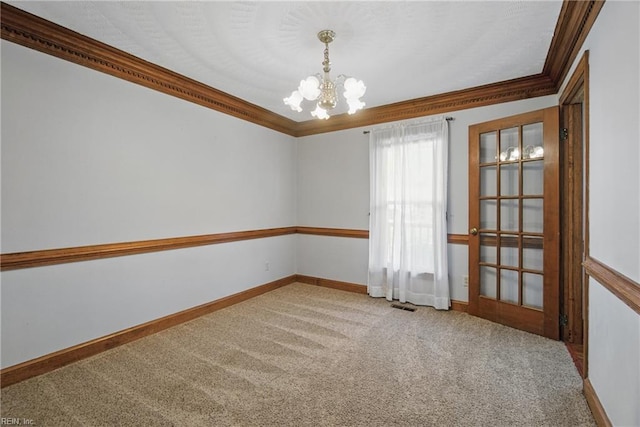 1121 Vineyard Dr, Chesapeake, VA 23322 - carpeted empty room with a chandelier, ornamental molding, and baseboards