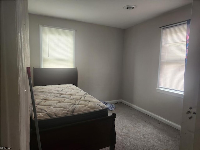 106 Clyde St, Hampton, VA 23669 - carpeted bedroom with baseboards